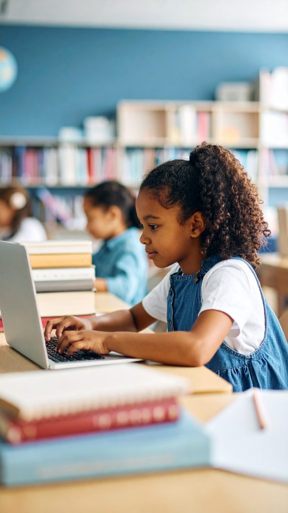 Les jeunes élèves en classe équipés d'ordinateurs_ by Firefly_African Girl 2025